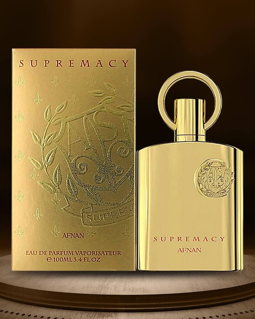 Afnan Supremacy Gold EDP bottle and box — luxury lifestyle image